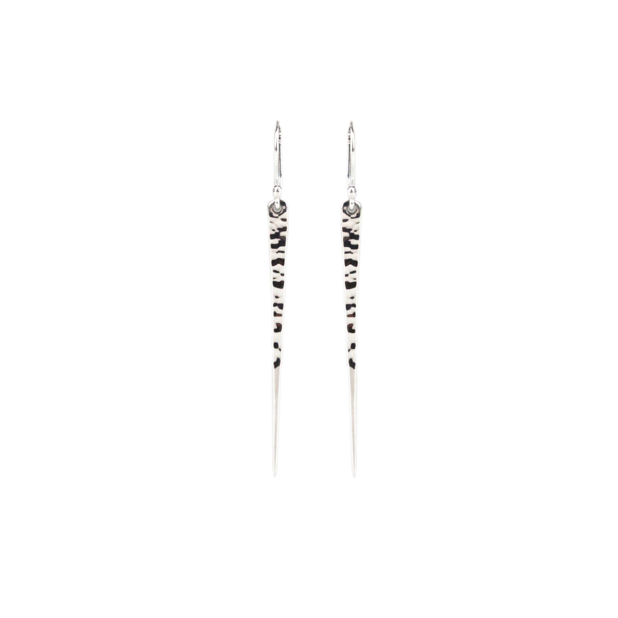 Highly polished beaten sterling silver earring in the shape of an icicle Antonia Scales jewellery