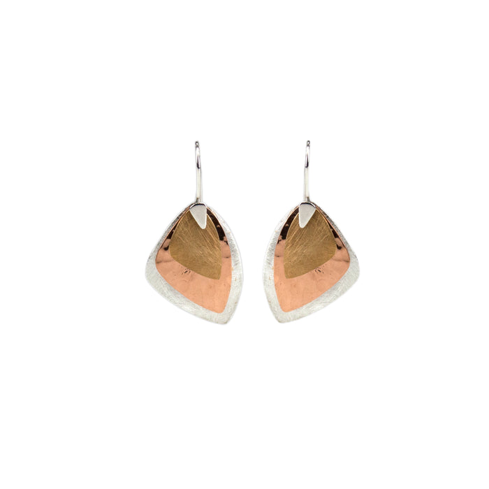 Earring with three layers of contrasting colours; silver, copper and brass, each with a different finish - scratched, hammered and brushed Antonia Scales jewellery